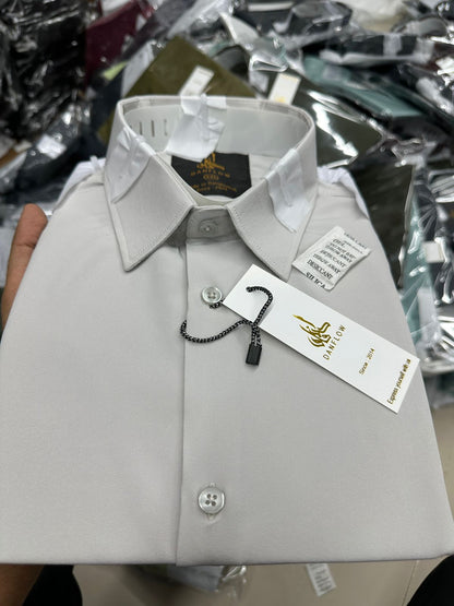 The Vibrant Essential Solid Shirt Collection
Elevate your wardrobe with our collection of Essential Solid Long-Sleeve Shirts. Designed for versatile wear, these shirts offer a sharp, modern fit and are crafted from a comfortable, lightly textured fabric t